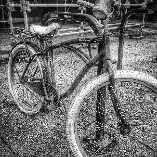Black And White Photograph - Locked Bike in Downtown Chicago by Paul Velgos