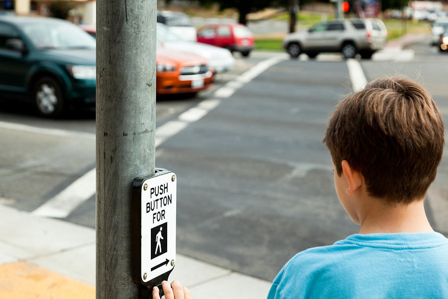 Child at Pedestrian Crossing Photograph by Slobo
