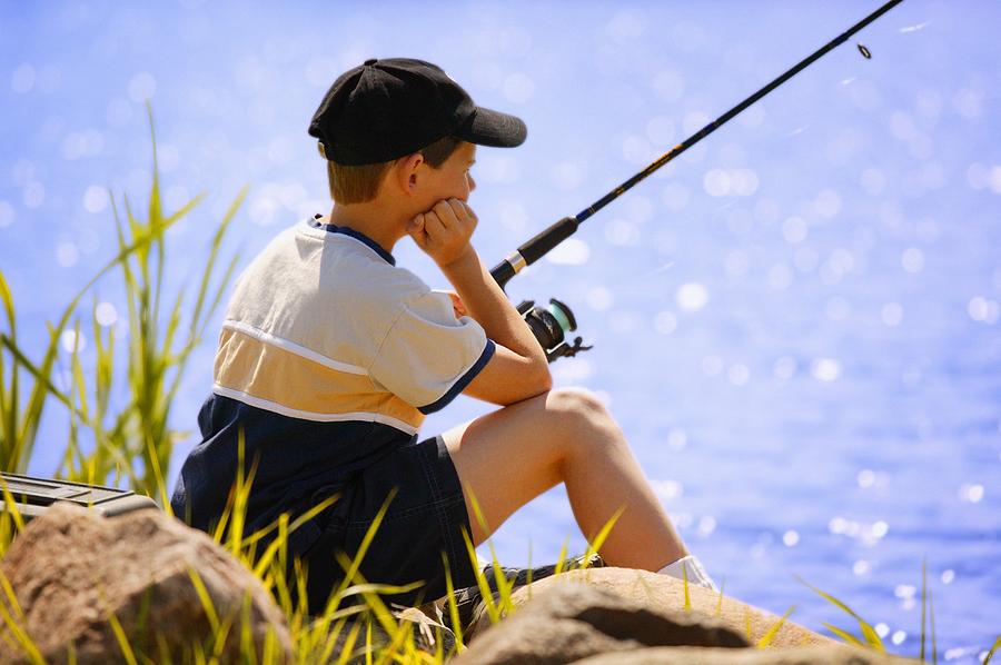 Sports Photograph - Child Fishing by Don Hammond