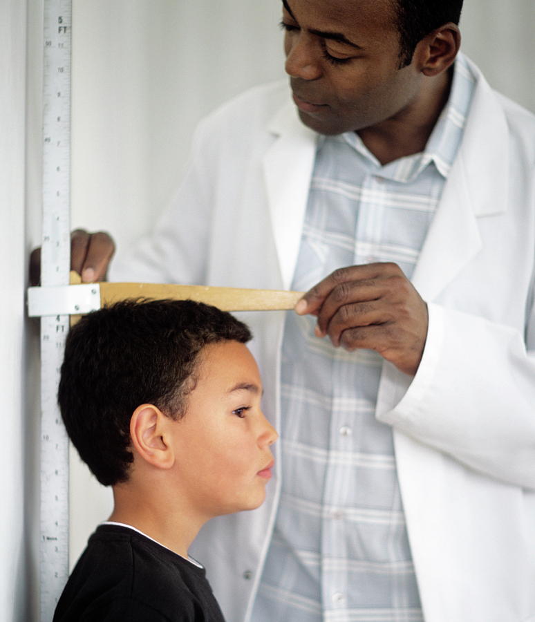 Child height measurement - Stock Image - F002/5315 - Science Photo Library