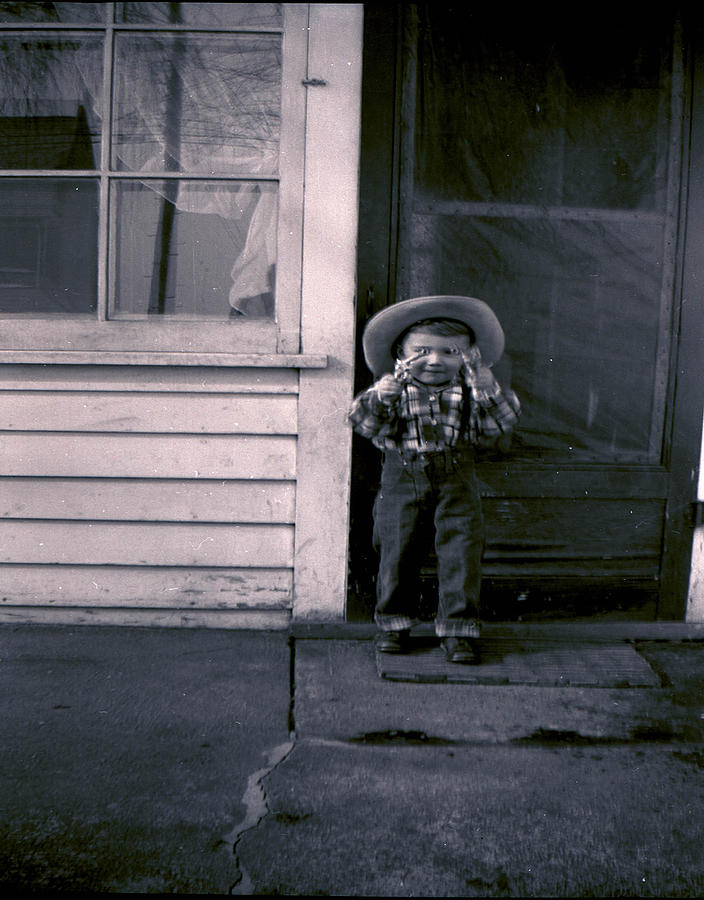 Child playing cowboy Photograph by Cathy Anderson