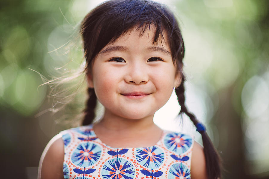 Child smiling cheerfully at camera Photograph by Images By Tang Ming Tung