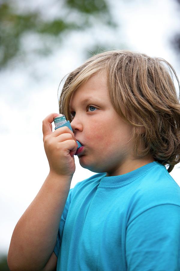 Child Using Asthma Inhaler Photograph by Lewis Houghton/science Photo Library