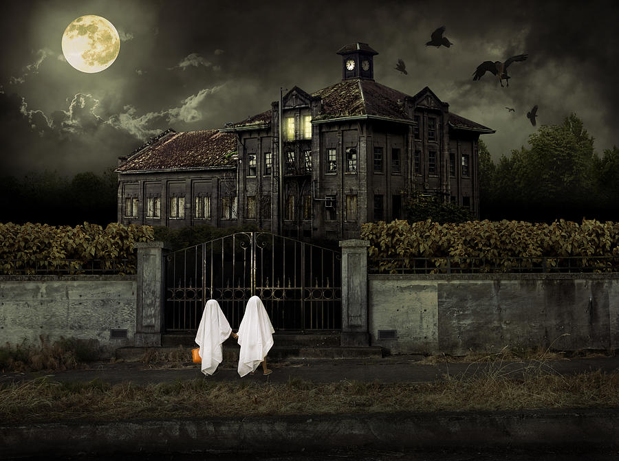 Children in Ghost Costumes Trick or Treat at Haunted House Photograph by Quavondo