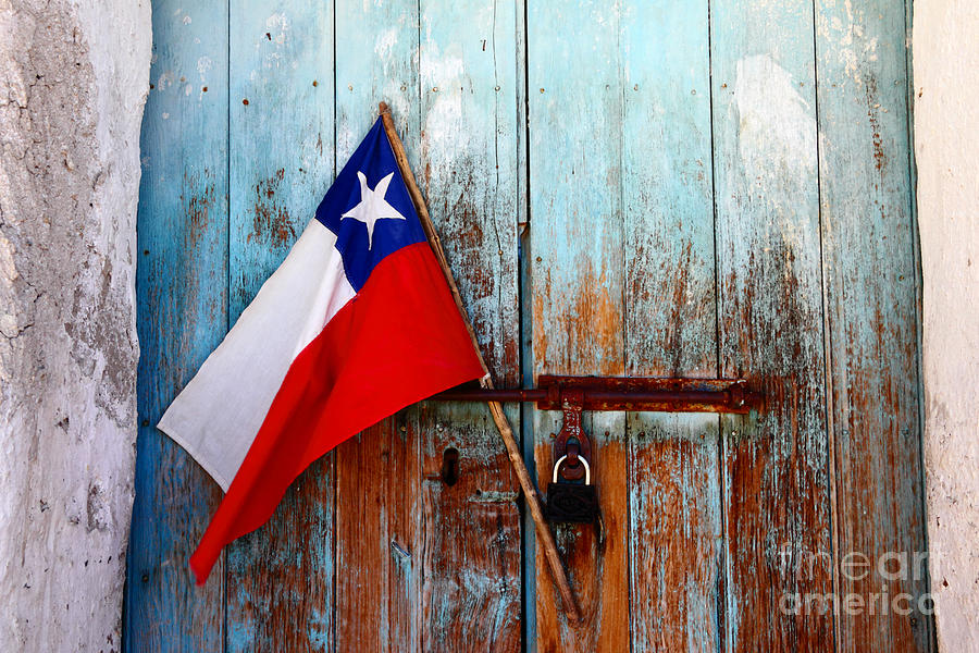 Chilean Flag on Old Wooden Door Photograph by James Brunker