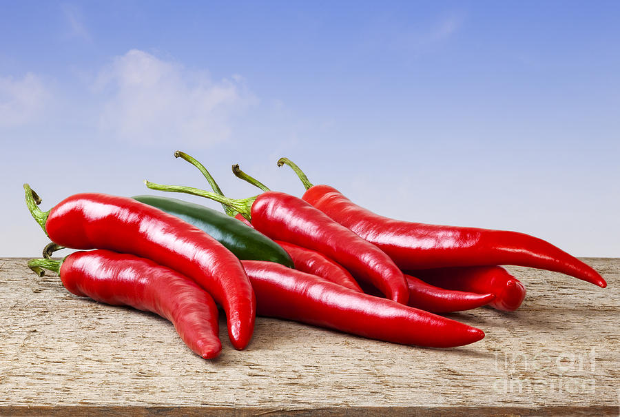 Chilli Peppers on Rustic Background Photograph by Colin and Linda McKie