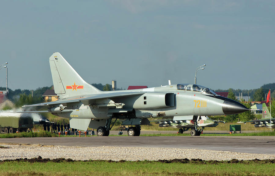 Transportation Photograph - Chinese Air Force Jh-7 During Aviadart by Giovanni Colla