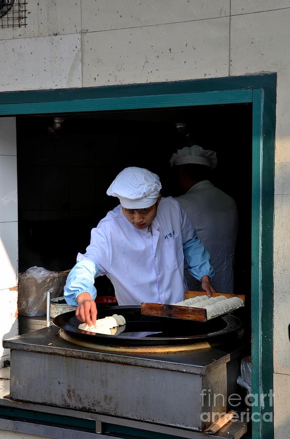 Chinese chef cooks food on outdoor skillet Shanghai China Photograph by Imran Ahmed