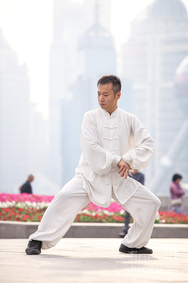 Chinese man practicing Tai chi Shanghai China Photograph by Matteo Colombo