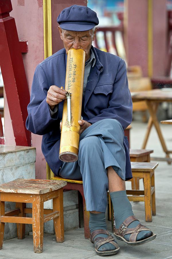 Chinese Man Smoking A Water Pipe. Photograph by Tony Camacho - Fine Art  America