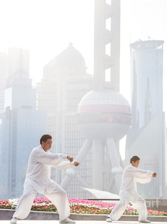 Chinese men practicing Tai chi Shanghai China Photograph by Matteo Colombo