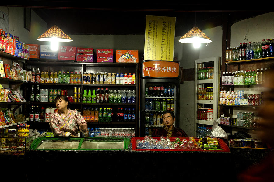 Chinese Shopkeepers Hangzhou China Photograph by Sally Ross