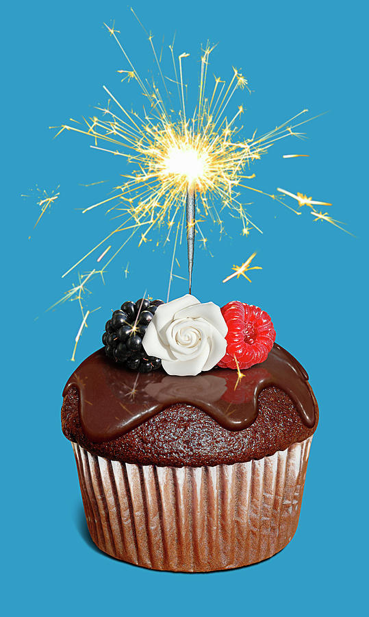 Chocolate Cupcake With Sparkler Photograph by Ikon Ikon Images