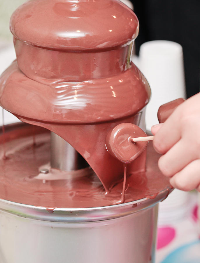 Candy Photograph - Chocolate fountain by Tom Gowanlock