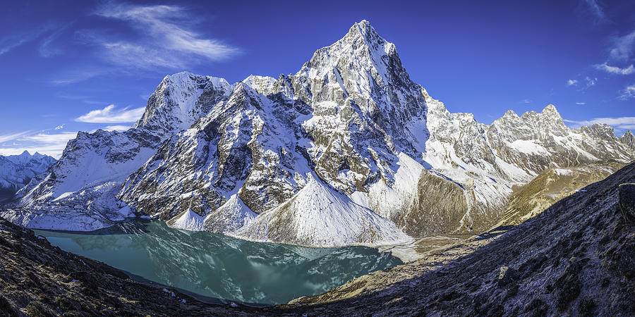Cholatse dramatic mountain peak towering over glacial lake Khumbu Himalayas Photograph by fotoVoyager