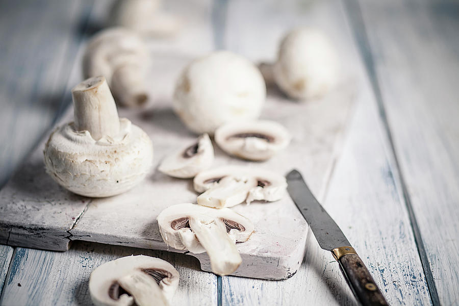 Chopped Champignons On Chopping Board Photograph by Westend61
