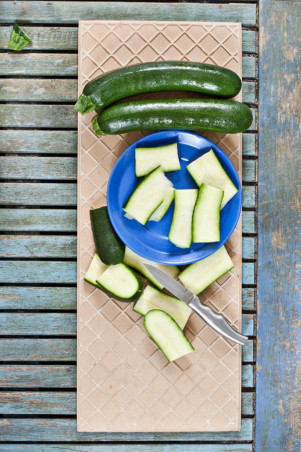 Knife Still Life Photograph - Chopped courgette by Tom Gowanlock