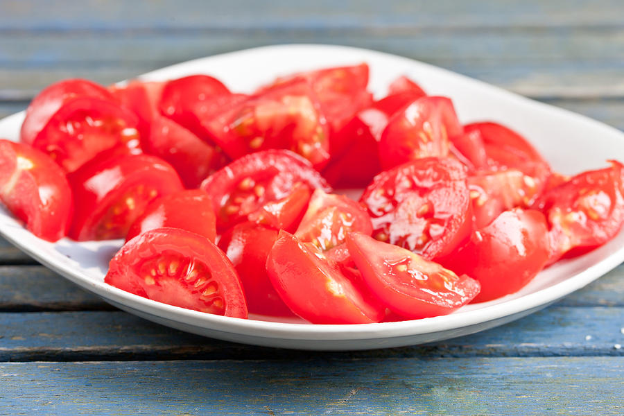 Summer Photograph - Chopped tomatoes by Tom Gowanlock