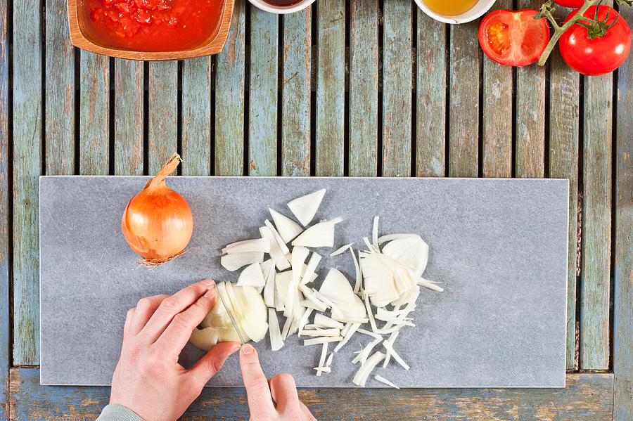 Tomato Photograph - Chopping onions by Tom Gowanlock