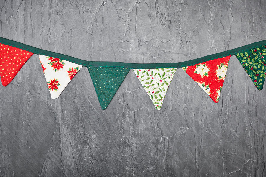 Christmas bunting Photograph by Tom Gowanlock