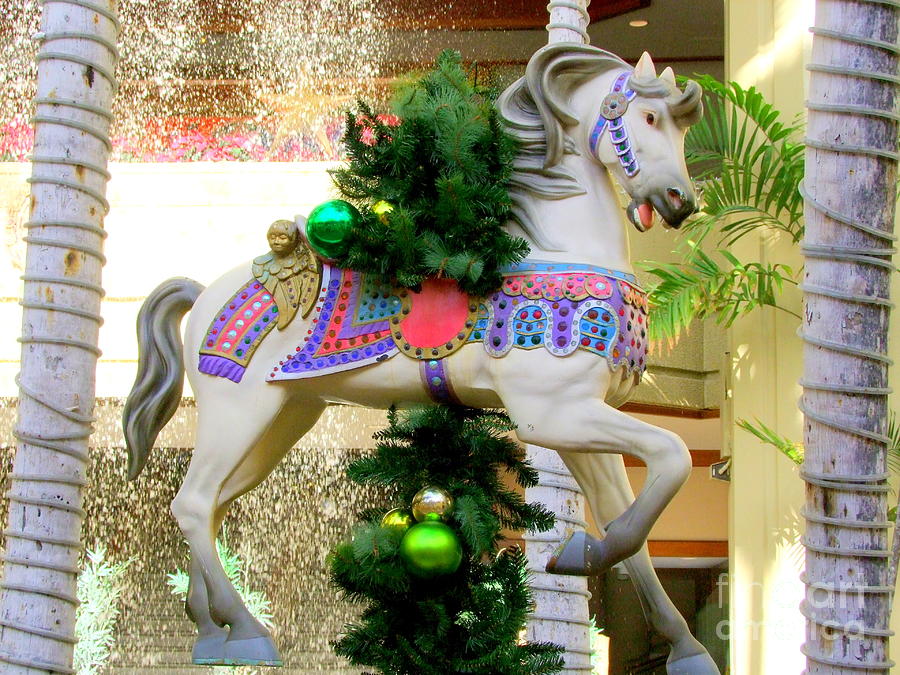 Christmas Carousel Horse with Pine Branch Photograph by Mary Deal