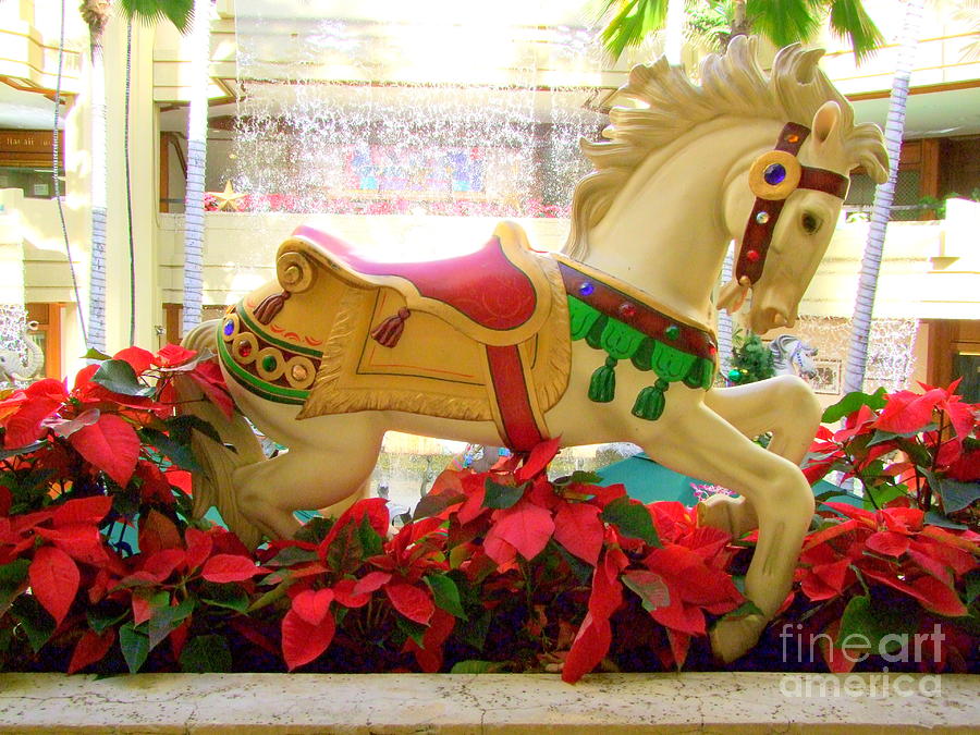 Christmas Carousel Horse with Poinsettias Photograph by Mary Deal