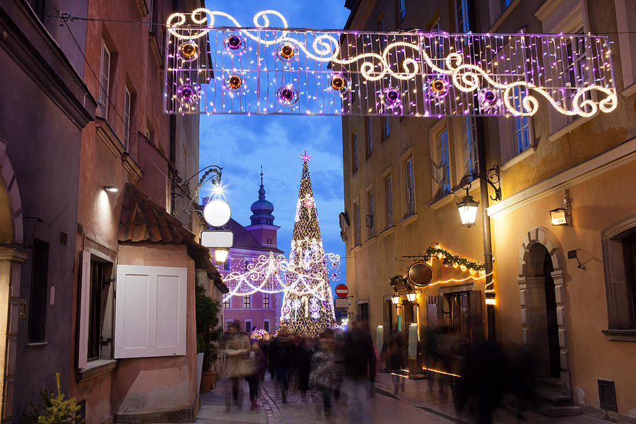 Christmas Photograph - Christmas Illumination on Piwna Street in Warsaw by Artur Bogacki