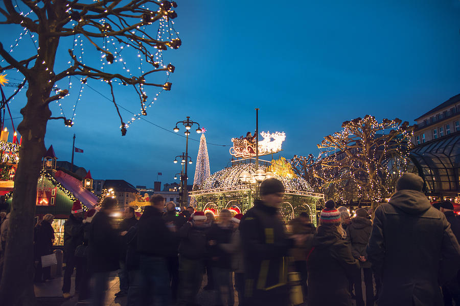 Christmas market at the Hamburg Rathaus Markt Photograph by Laura Battiato