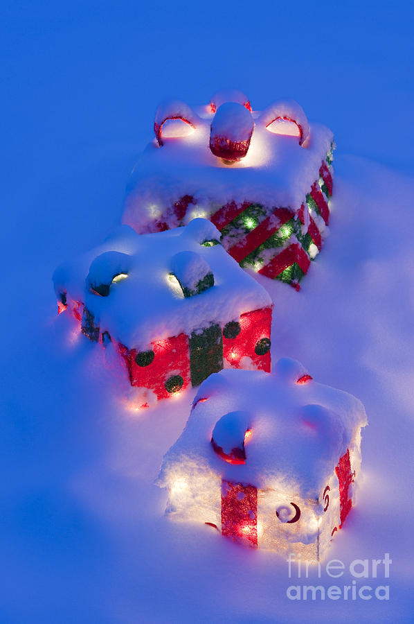 Christmas presents in snow Photograph by Jim Corwin