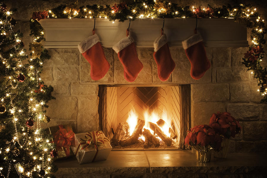 Christmas stockings, fireplace, tree, and decorations Photograph by Dszc
