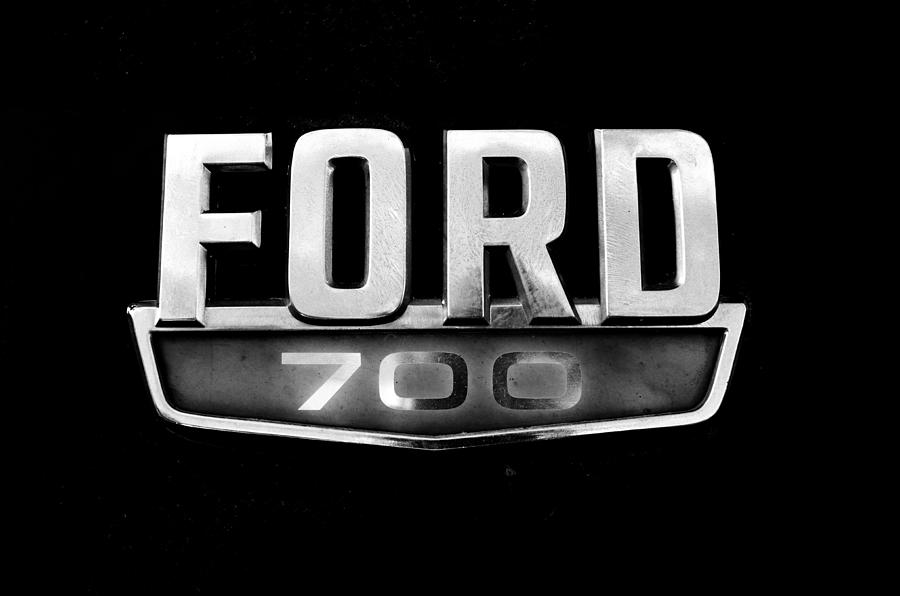 Chrome Ford 700 Emblem Photograph by Tom Druin