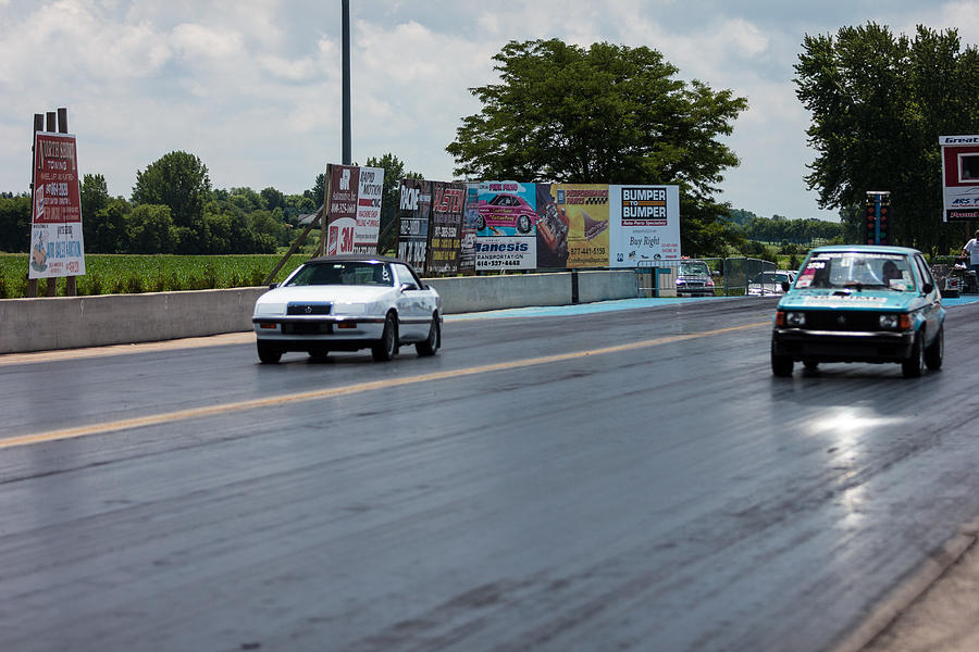 Chrysler LeBaron Convertible vs Plymouth Horizon - 02 Photograph by Josh Bryant
