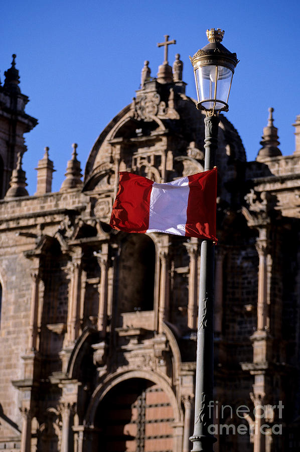 Church and flag Cusco Peru Photograph by Ryan Fox