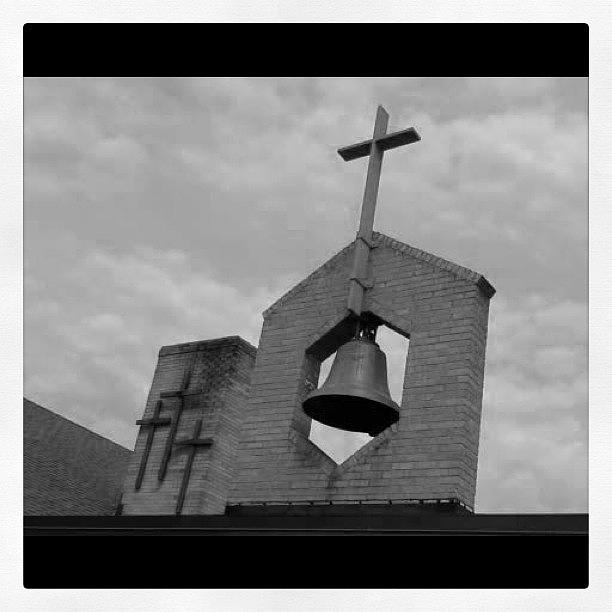 Christian Photograph - Church Bell Crosses Gray Sky by Donny Seelhoff