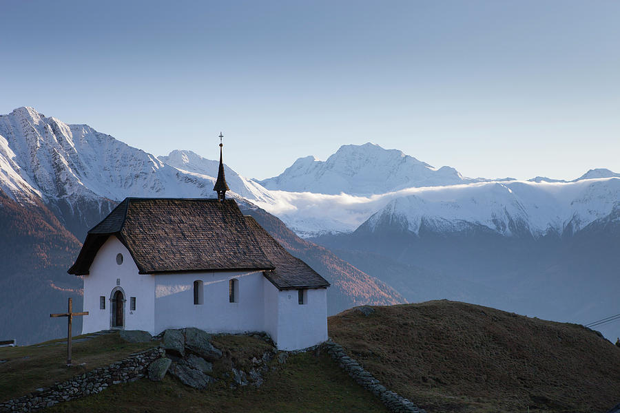 Nature Photograph - Church In Village Of Bettmeralp by Menno Boermans