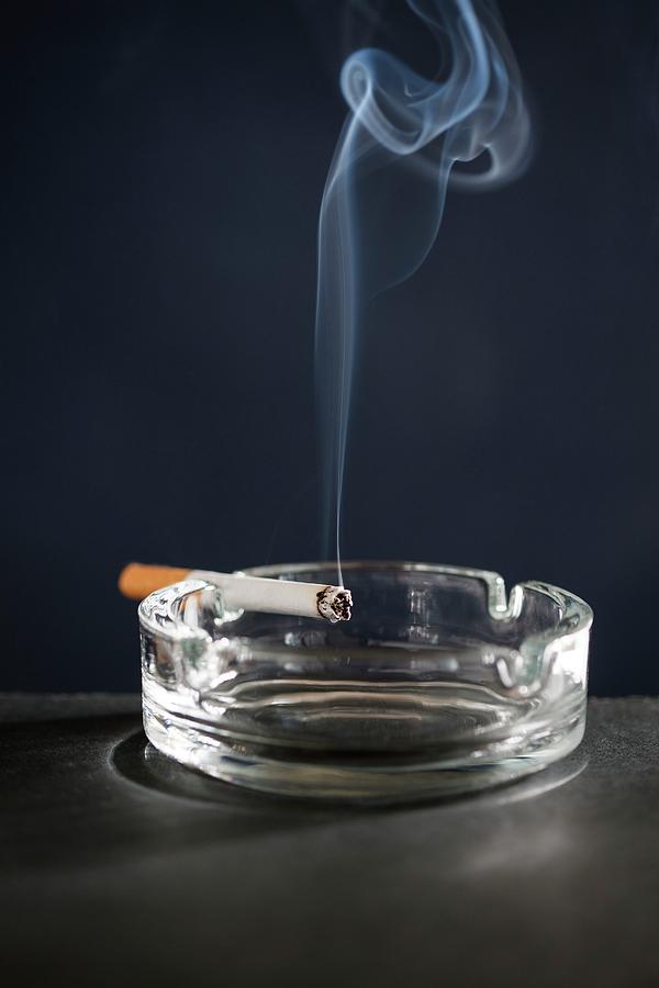 Cigarette On Ash Tray With Smoke Photograph by Cristina Pedrazzini ...