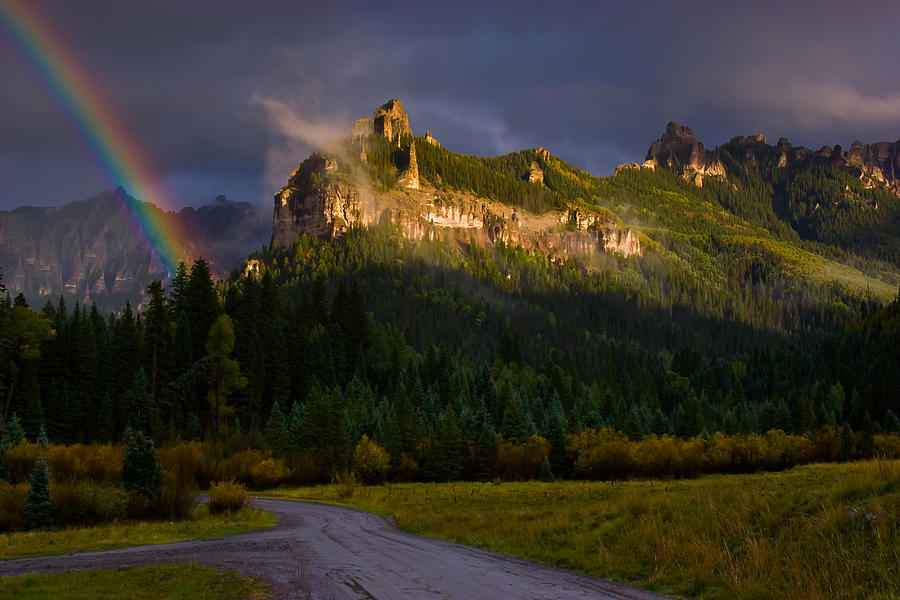 Mountains Photograph - Cimarron rainbow by Mike  Bennett