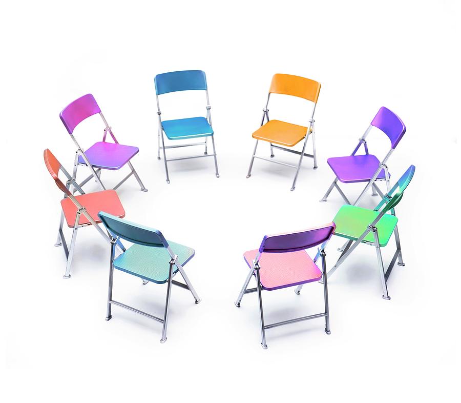 Circle Of Chairs Of Different Colours Photograph by Cordelia Molloy/science Photo Library