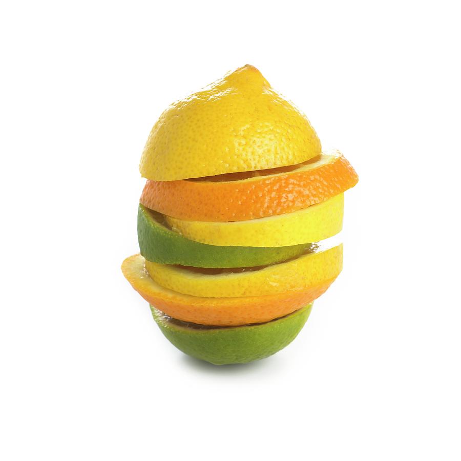 Citrus Fruit Slices In A Stack Photograph by Science Photo Library