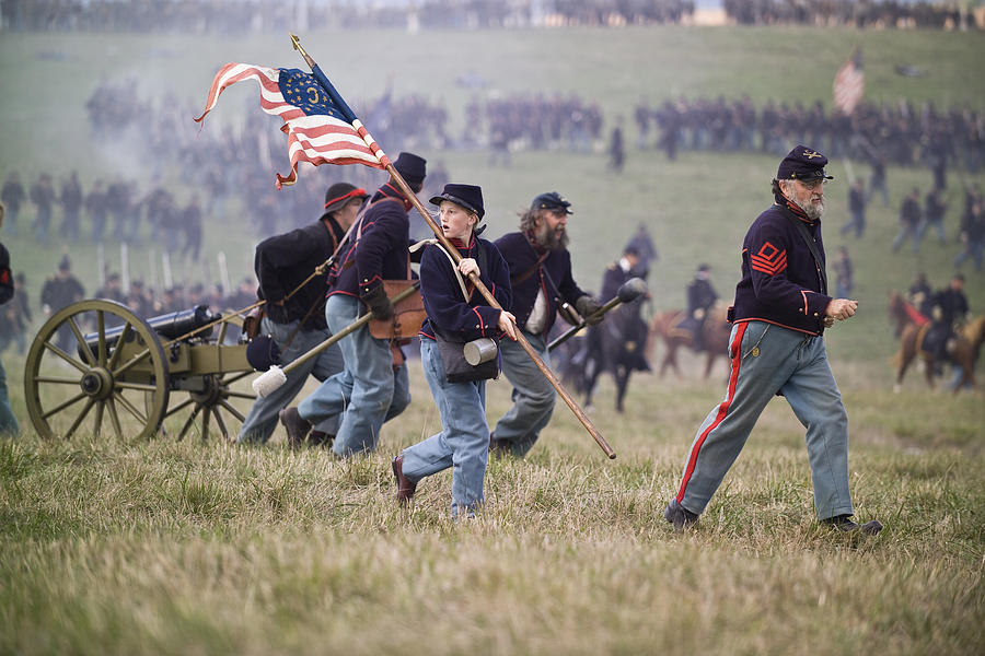 Civil War Reenactment Soldiers Running With Artillery Piece Photograph by DenGuy