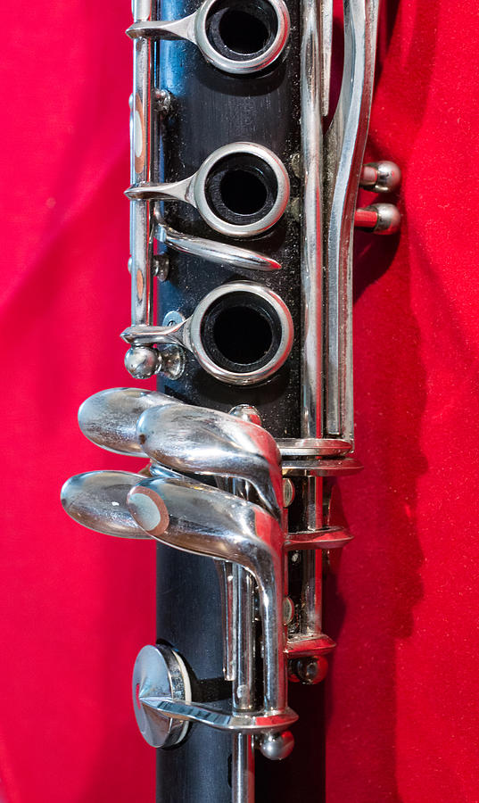 Clarinet on Red Vertical Photograph by Photographic Arts And Design Studio