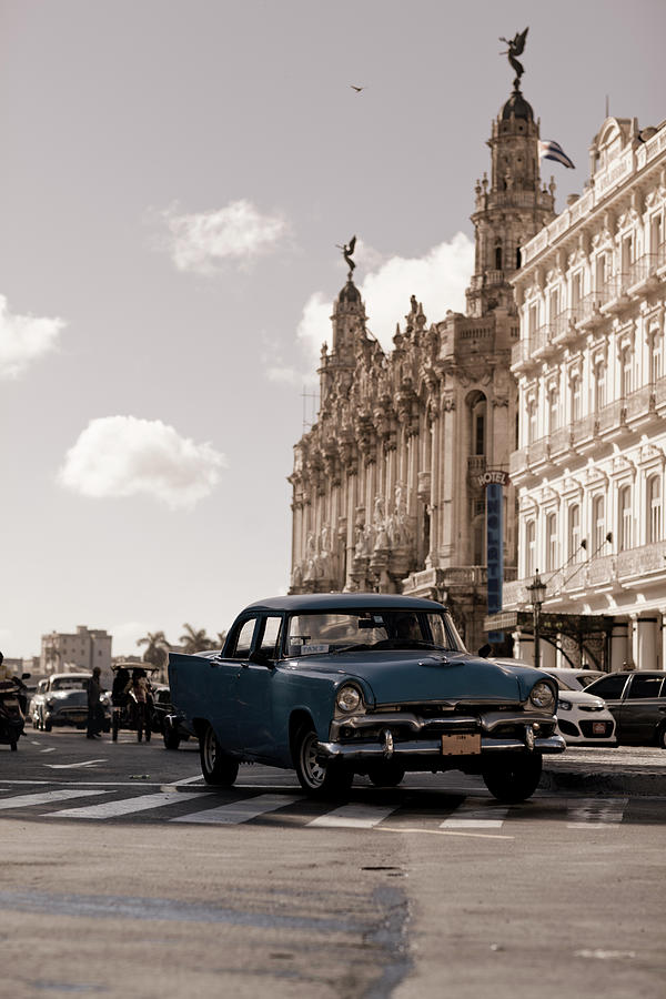 Classic Car Passing Havana Theatre Photograph by Merten Snijders