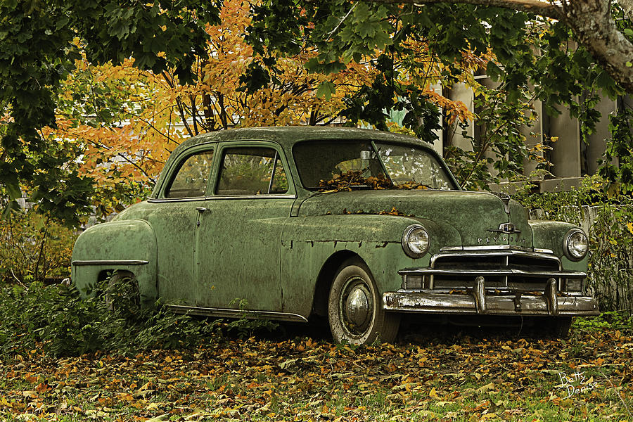 Fall Photograph - Classic Green Plymouth Sedan by Betty Denise