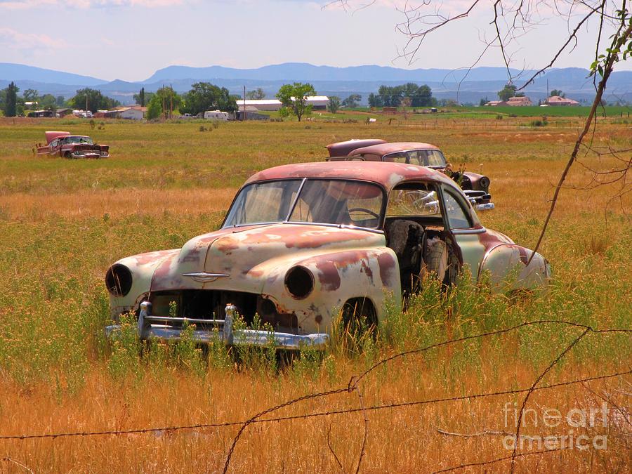  Classic  Rusty Car  in Farm Field  Photograph by John Malone