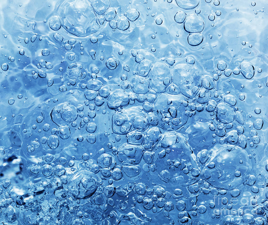 Nature Photograph - Clean water with bubbles appearing when pouring water or a splash by Michal Bednarek