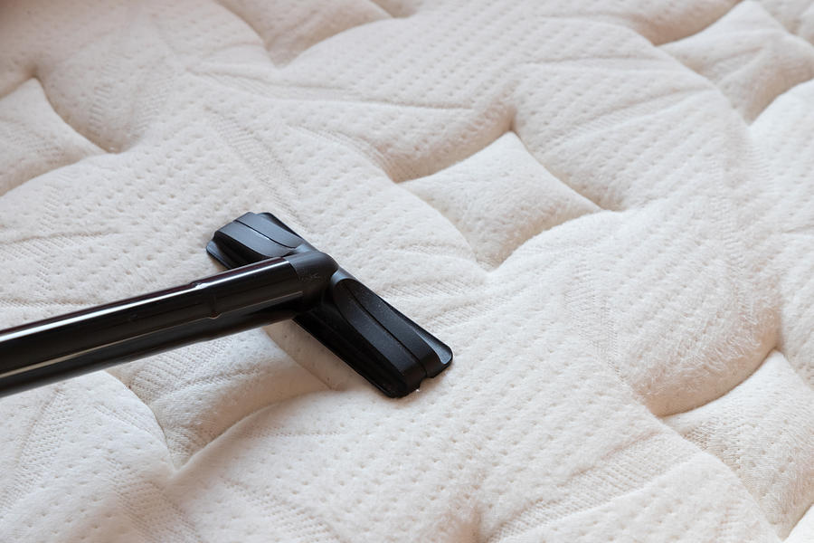 Cleaning Mattress By Vacuum Cleaner. Dust Mites On Bed, Texture. Concept : Allergy In Bed Room. Photograph by Ratchat