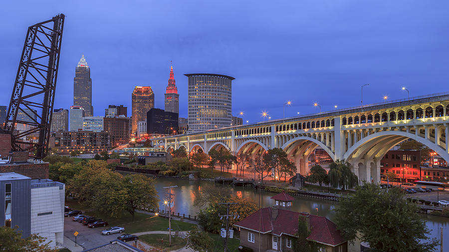 Cleveland Skyline View with Veterans Memorial Bridge in the evening lights. Photograph by David Shvartsman