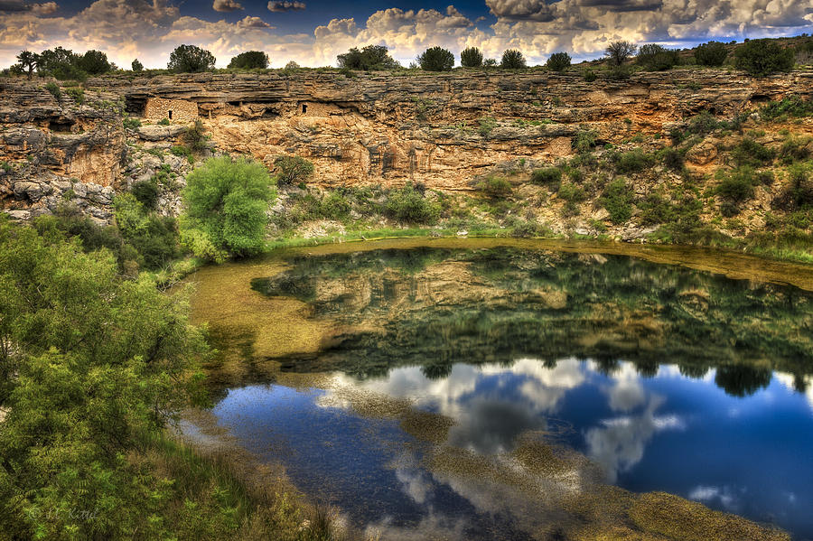 Nature Photograph - Cliff Dwellings with a Lake Front View by Medicine Tree Studios