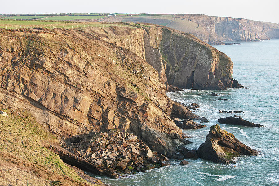Cliffs Along The Coastline Photograph by Paul Quayle / Design Pics