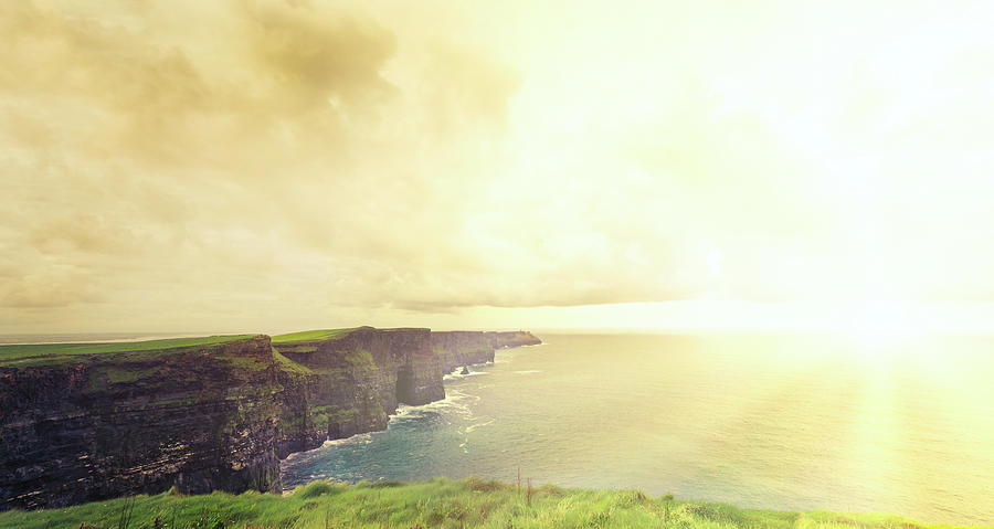 Cliffs Of Moher At Sunset . Panoramic Photograph by Hoaru